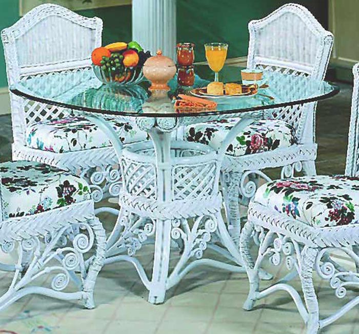 Glass and wicker dining table hotsell