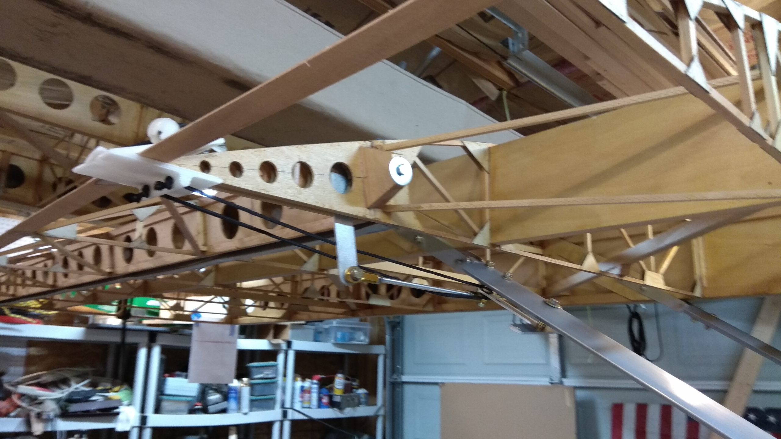 Install wings by mounting to the fuselage and adding attaching hardware