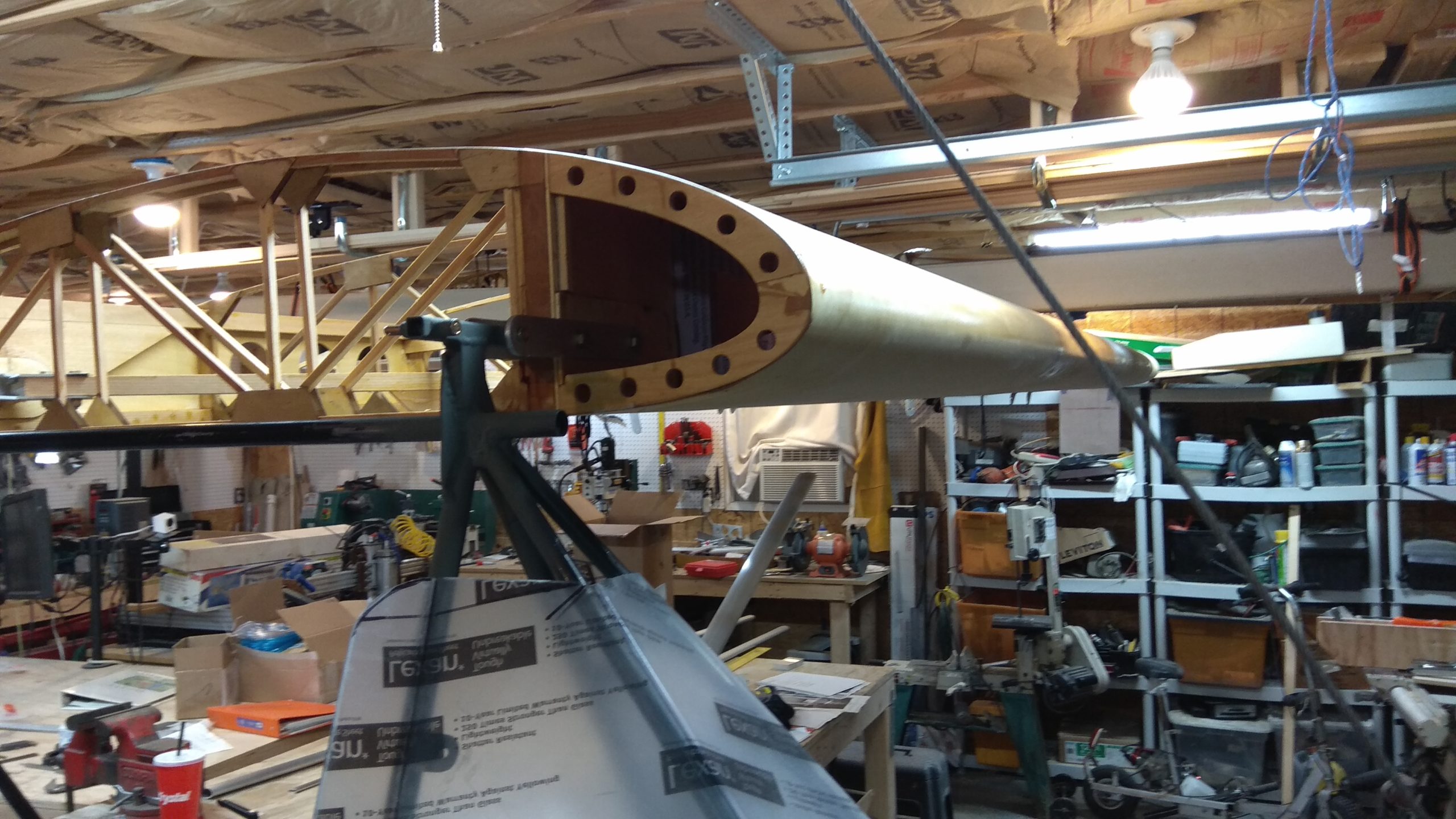 Install wings by mounting to the fuselage and adding attaching hardware