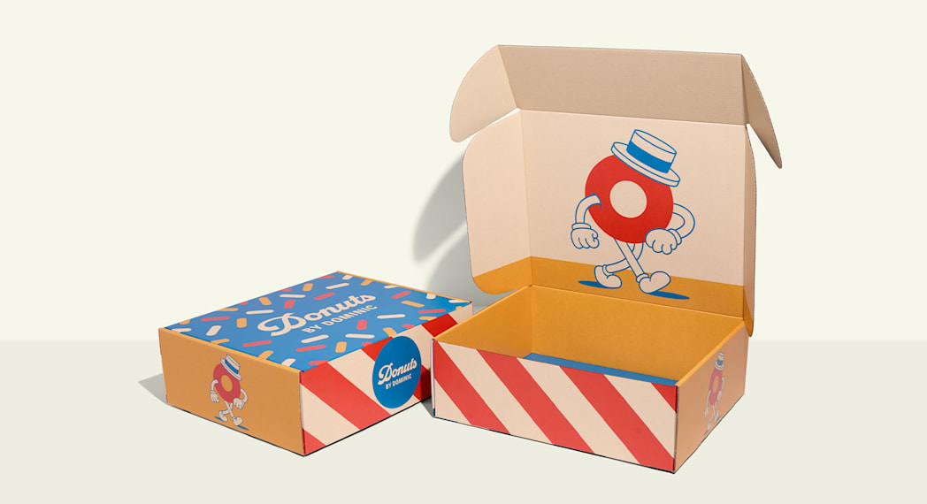 Two branded cardboard boxes for a donut company
