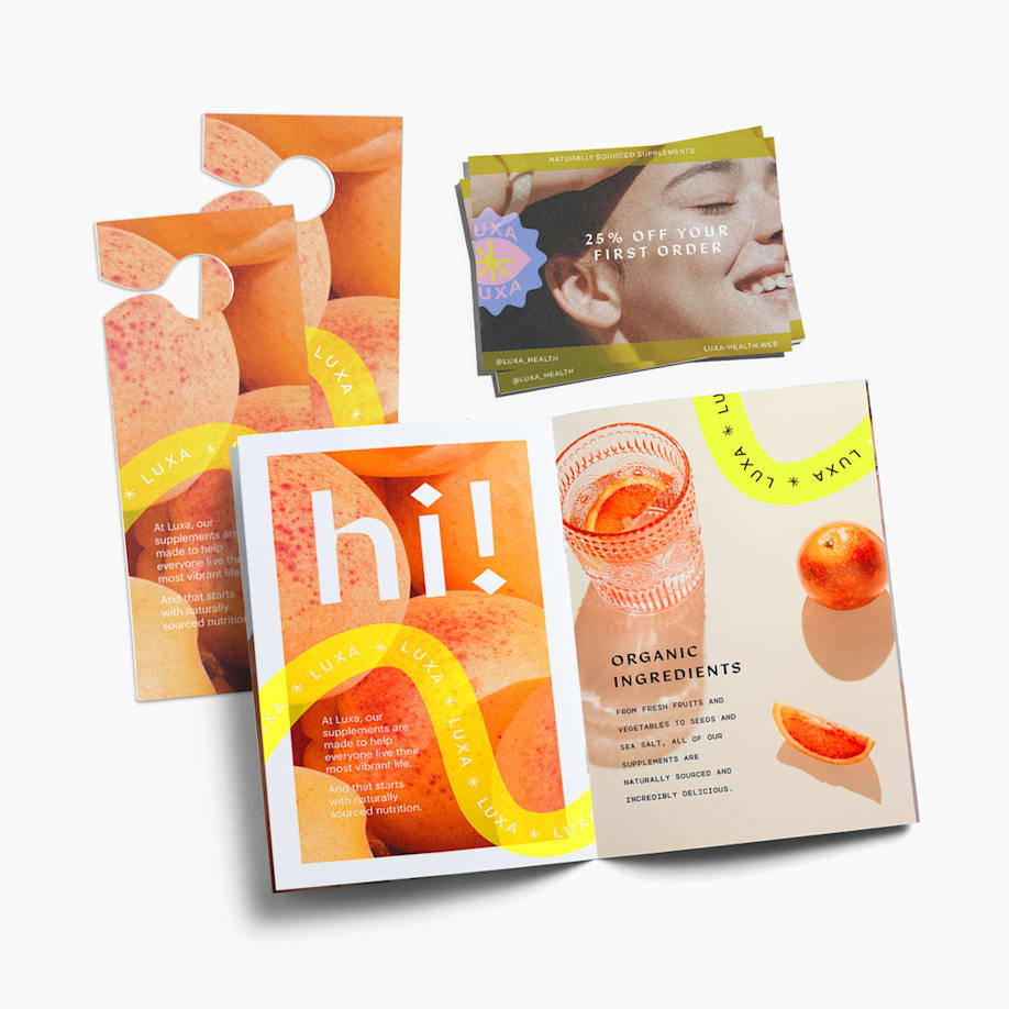 Branded marketing materials including a brochure and postcards promoting a discount