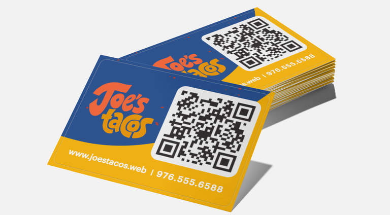 Blue and yellow business card with chunky orange &ldquo;Joe&rsquo;s tacos&rdquo; text and large QR code