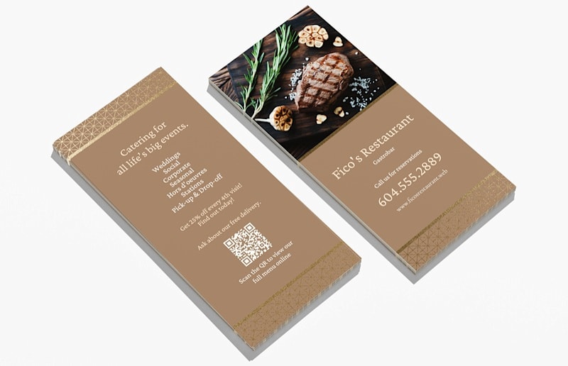 Two-sided slim business cards for Fico’s Restaurant featuring a grilled steak photo, catering details, contact information and a QR code.