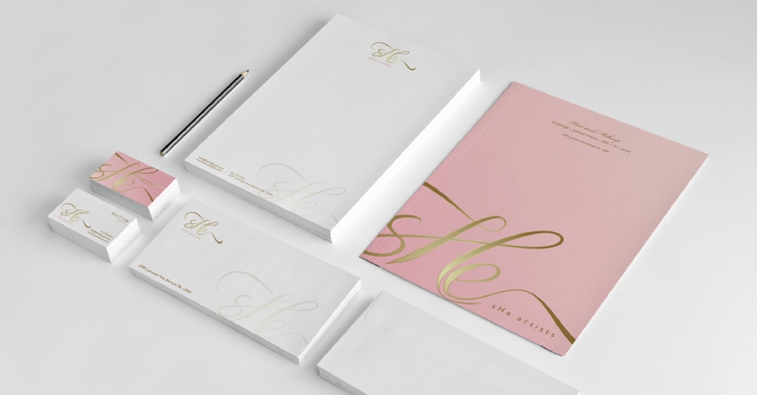 Pink, white and gold wedding stationery