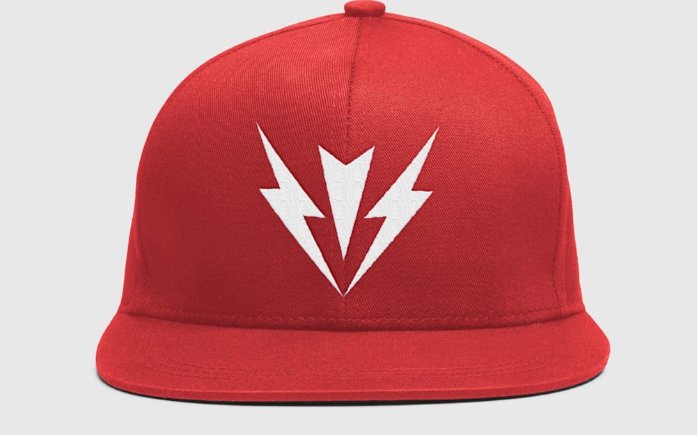 Wide-brimmed red baseball hat with bold white “superhero-style” logomark embroidered