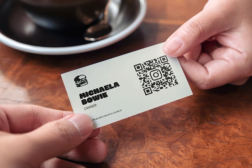 Black and white business card with QR code