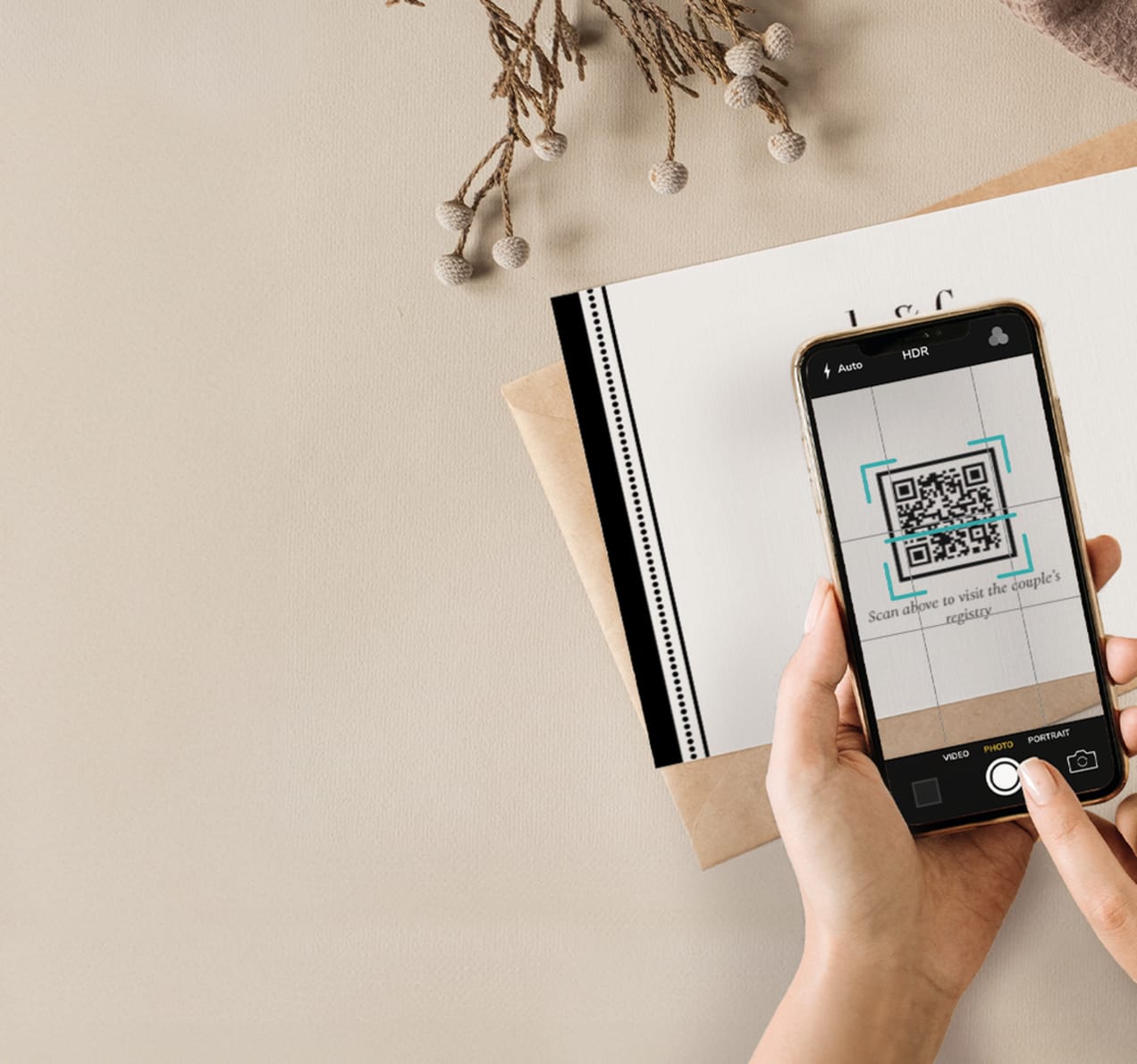 Someone using phone to scan QR code wedding invite to access wedding registry