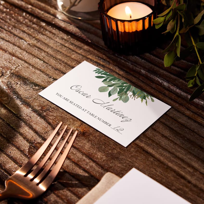 Custom place card with the guest&rsquo;s name and seating directions