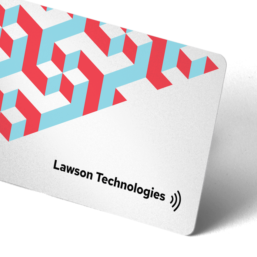 Close-up of a white NFC business card with colorful geometric patterning and rounded corners.