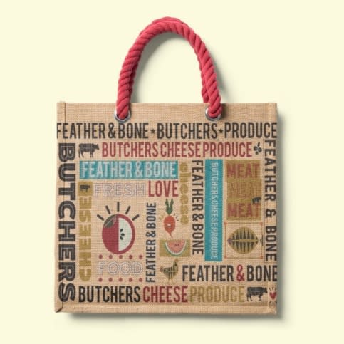 canvas bag showing a printed grocery design with images and words