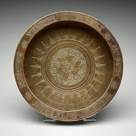 Copper tray showing the three hares symbol