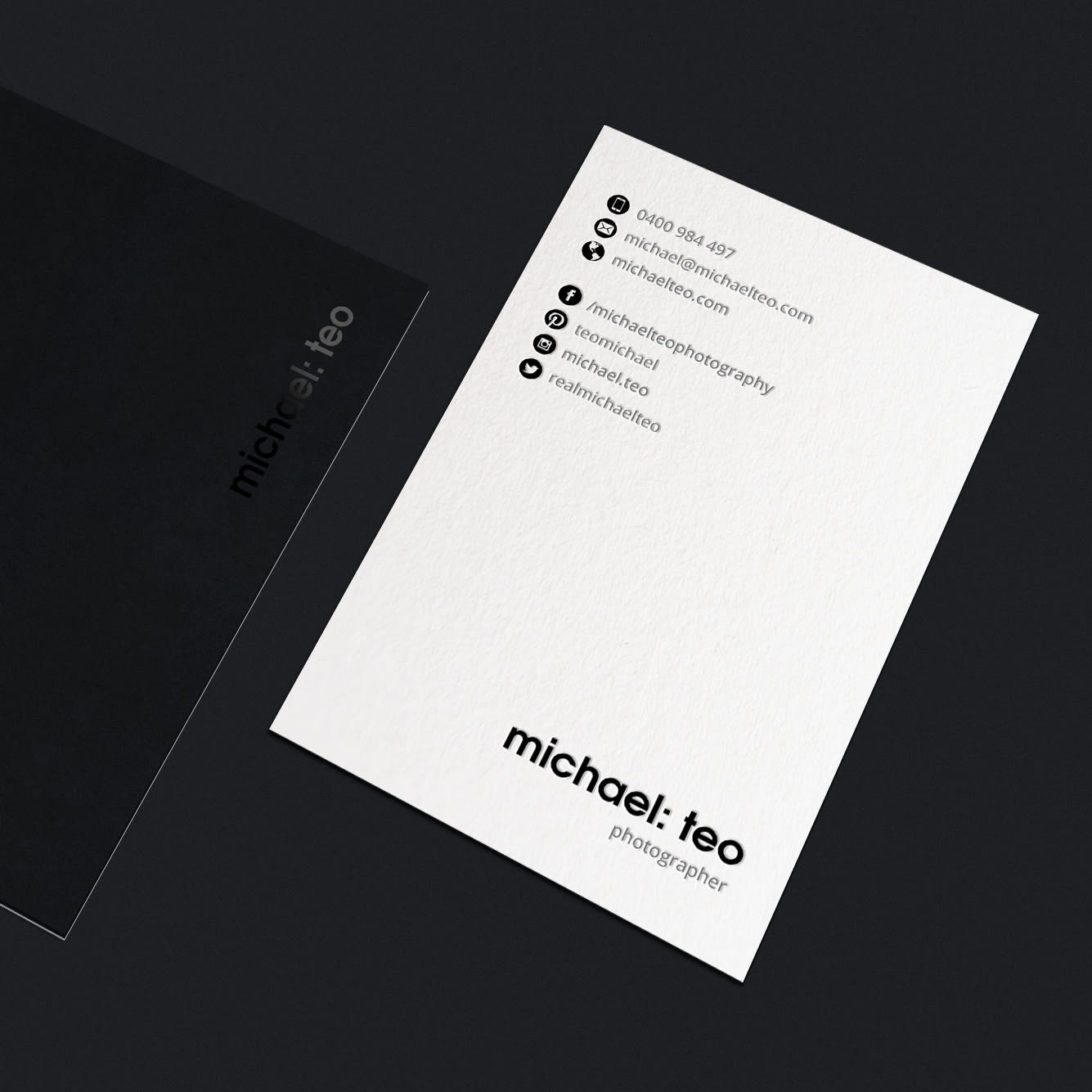 A black and white business card
