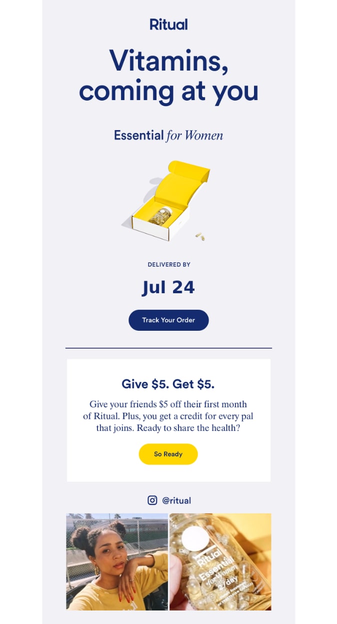 an open box with a glass of multivitamins in the center with the expected delivery date and tracking order link below it