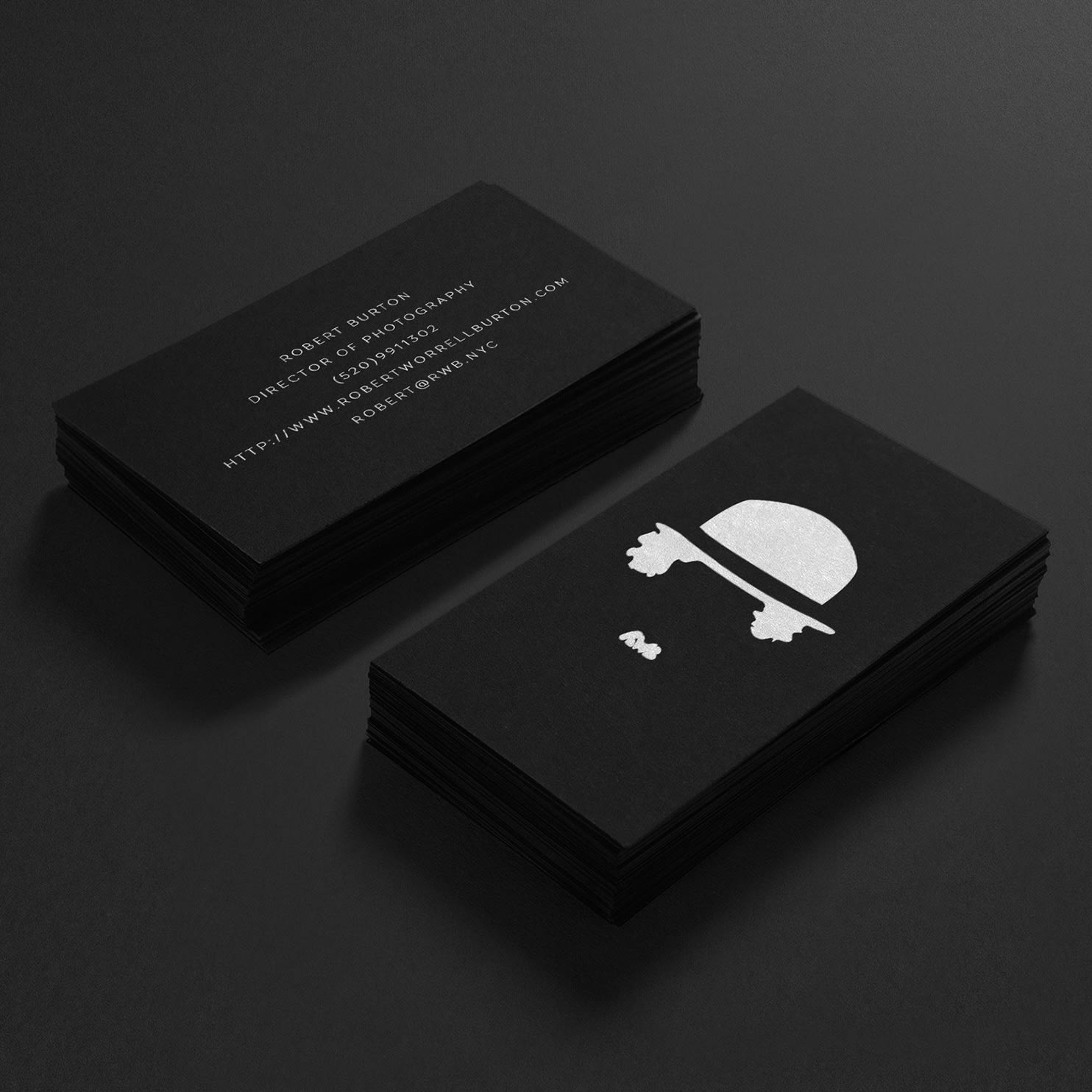 Business card featuring a minimalist portrait of Charlie Chaplin