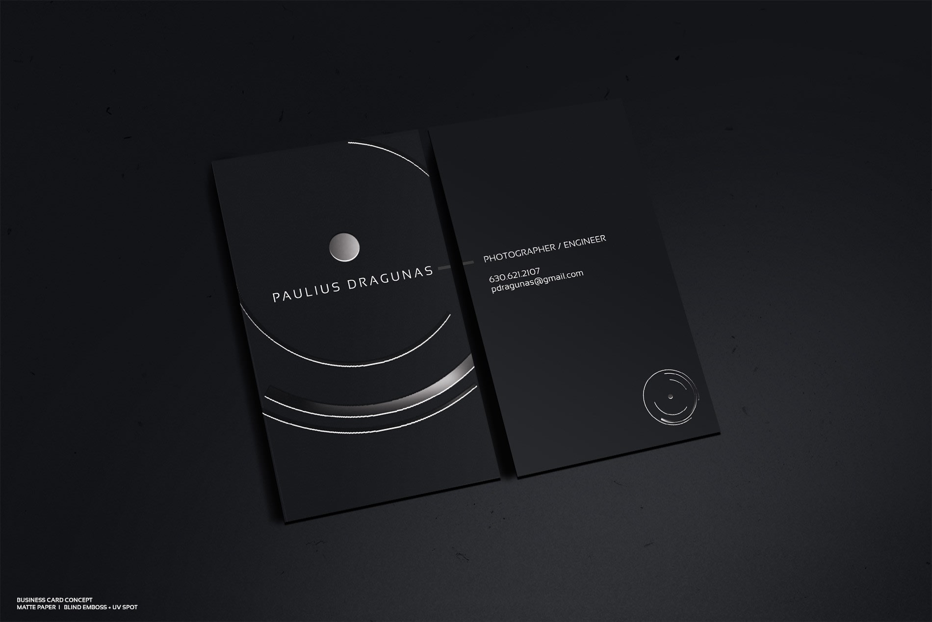 Black and silver business card for a photography brand