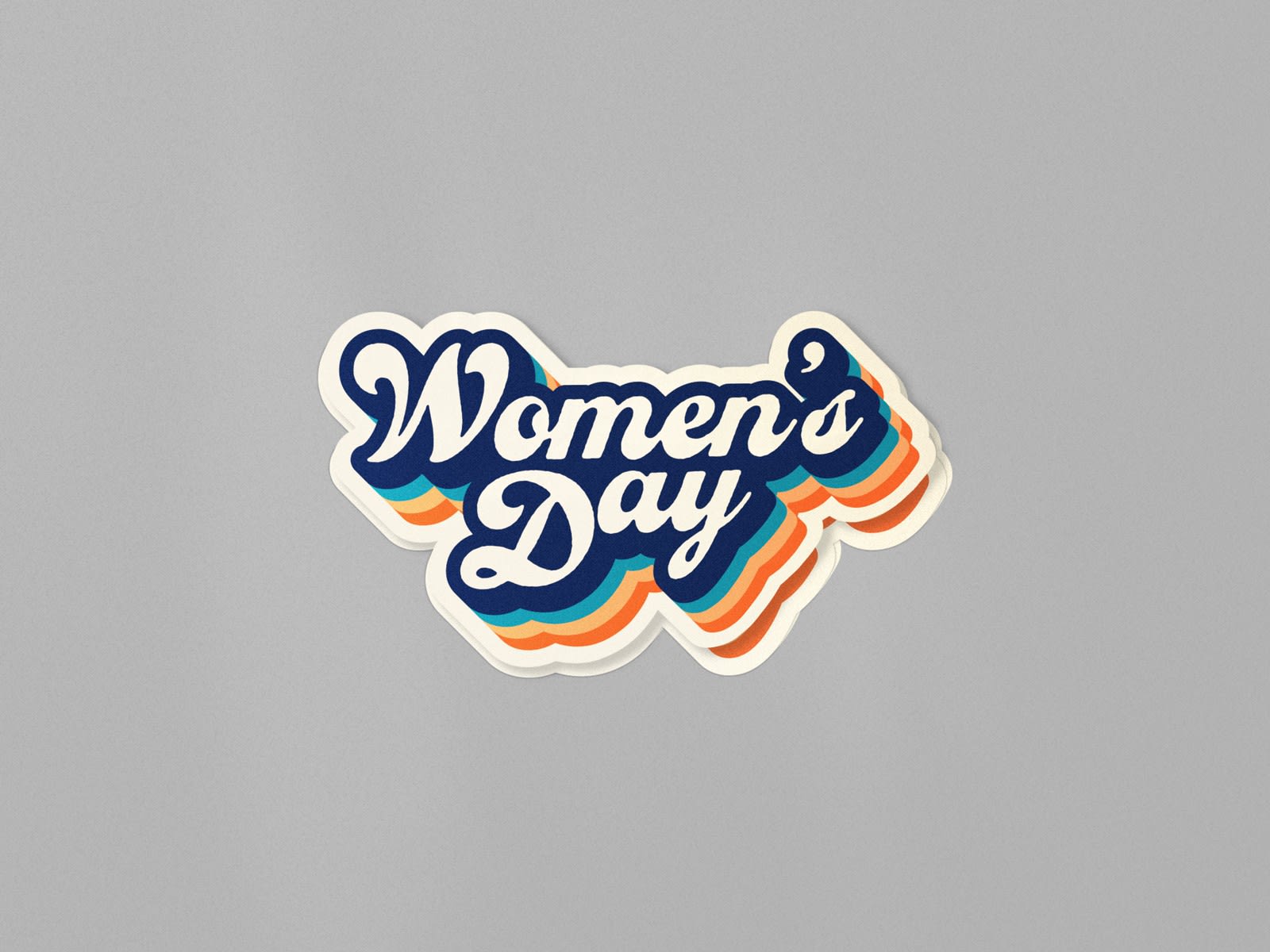 Multicolored women’s day sticker that uses a bold retro font
