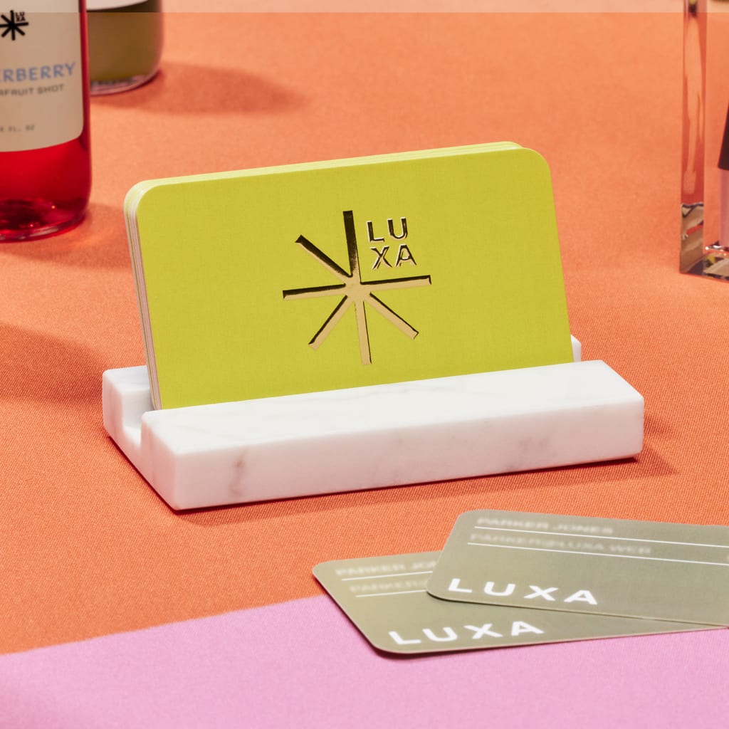 Storing business cards in a metallic card holder is good business card etiquette