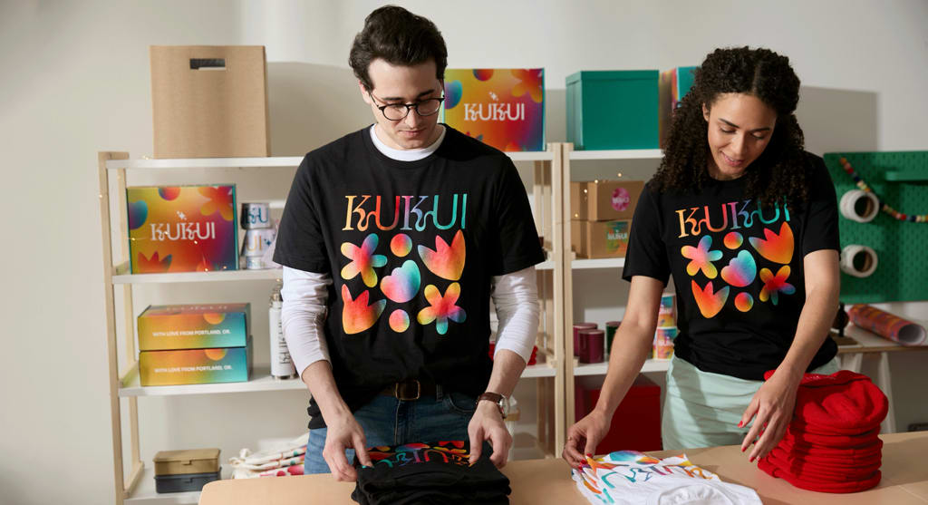 Employees wearing branded T-shirts