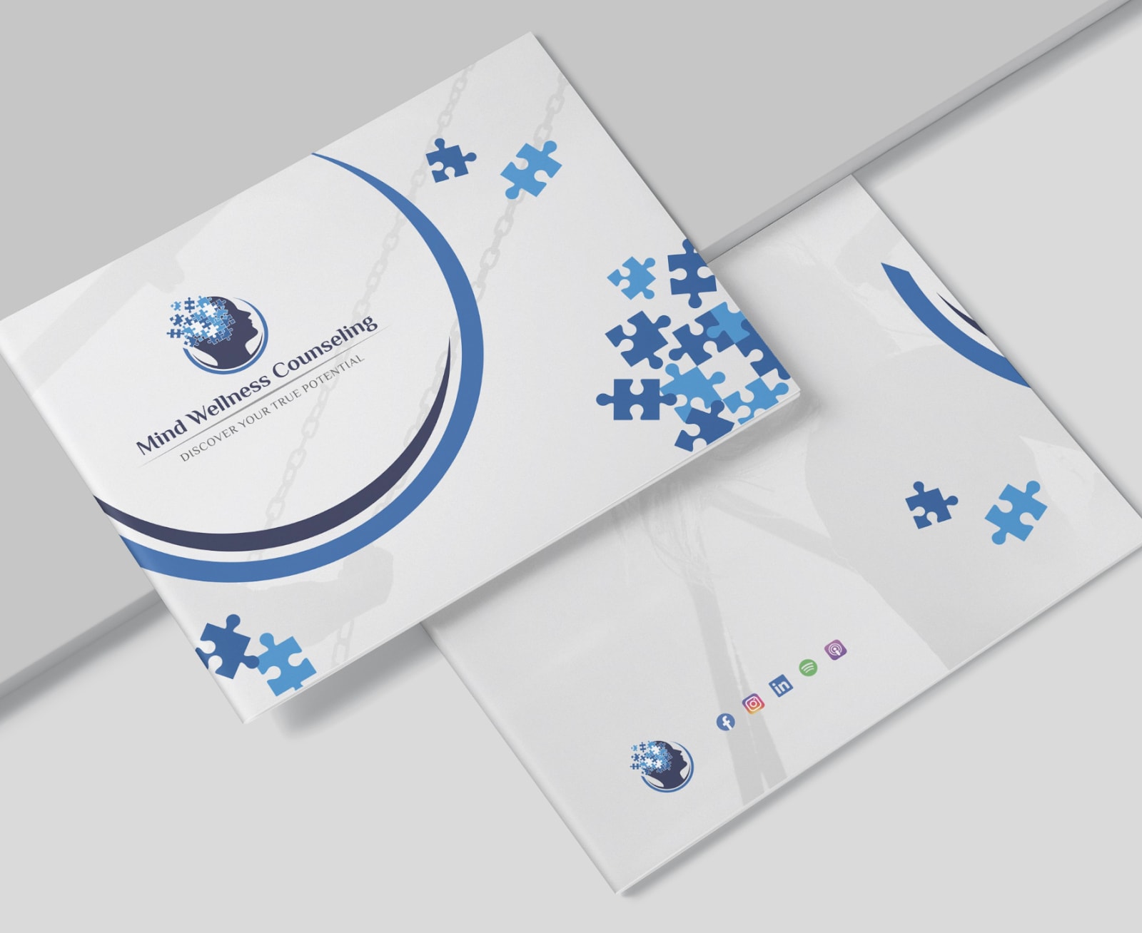 Blue business card design with social icons on the back.