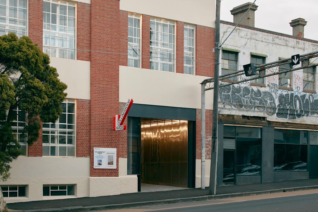Hanging blade sign in a shape of an arrow.