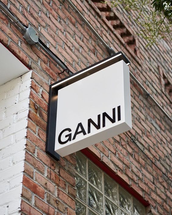 Ganni hanging blade outdoor signage.