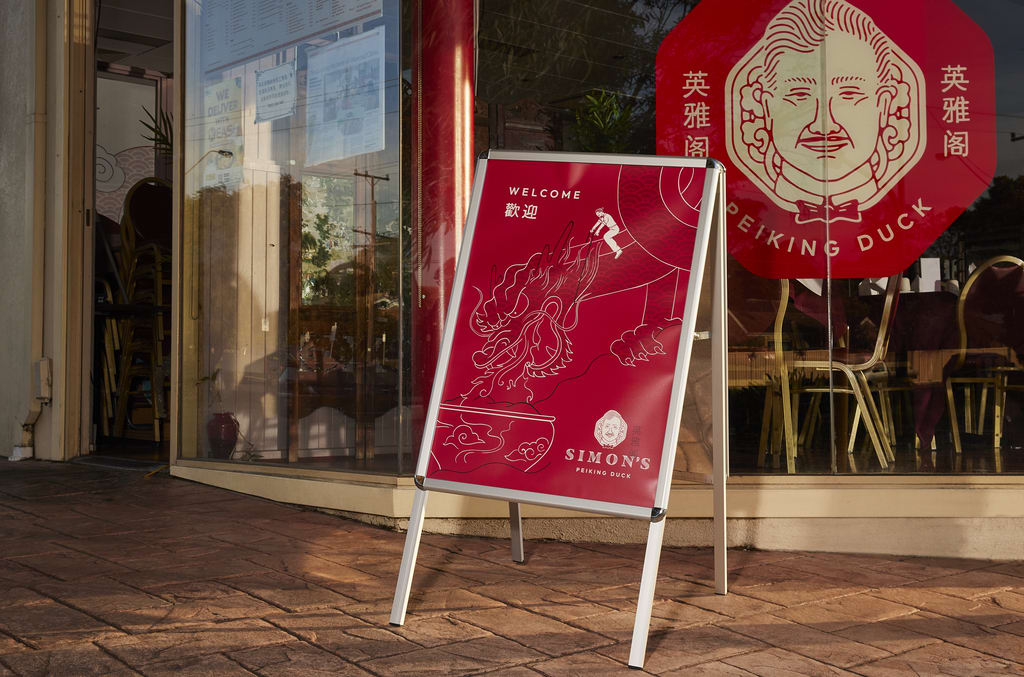 Red A-frame sign for a restaurant