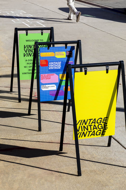 A-frame signs on the sidewalk.