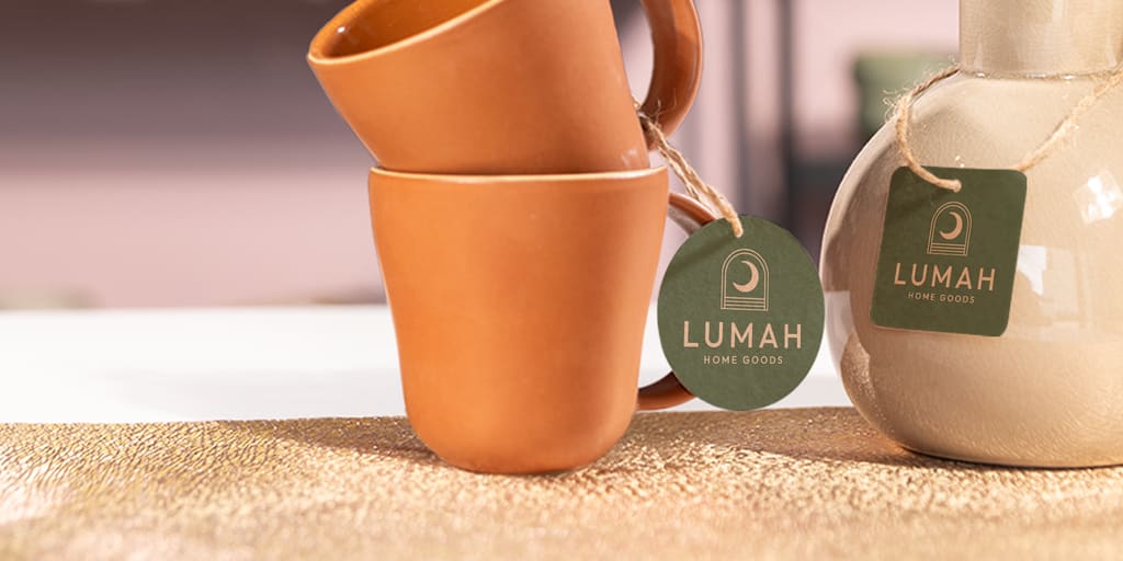 Product changes can reflect the fall season, like these hygge-inducing terra cotta mugs with custom dusty sage brand tags