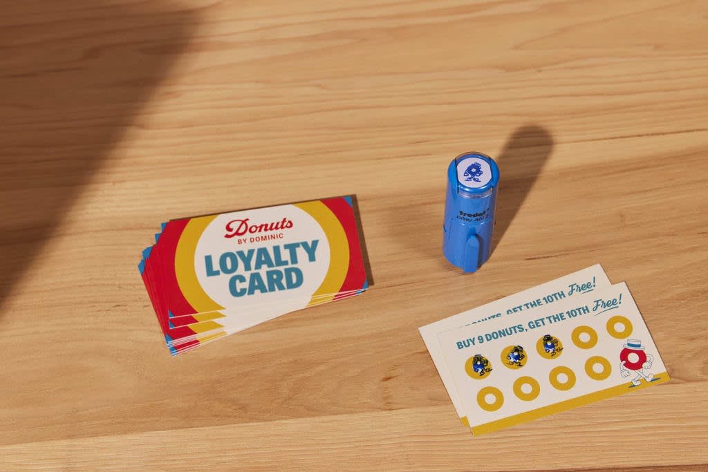 Business customer loyalty cards with a custom stamp brand equity