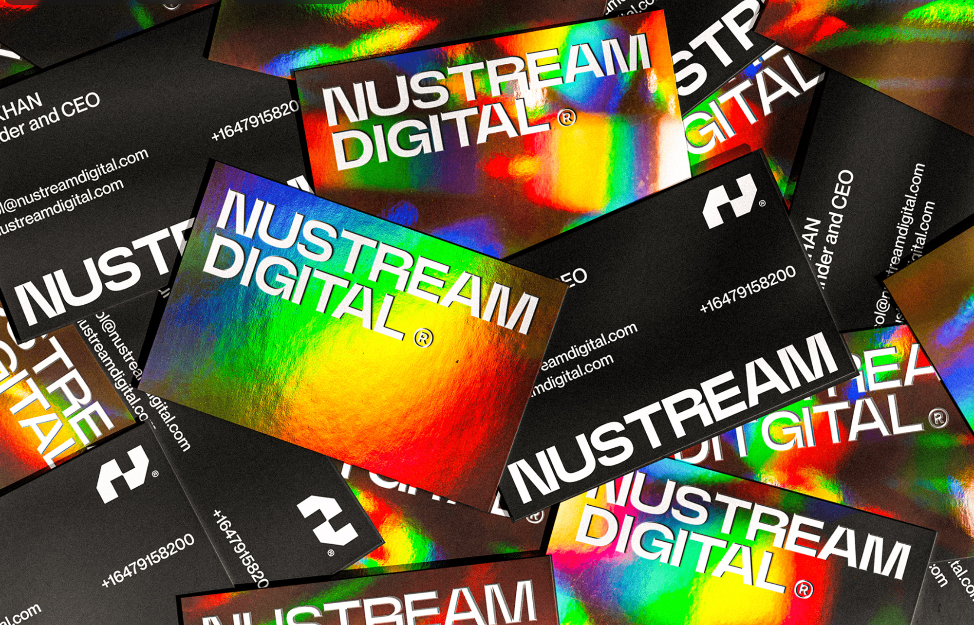 rainbow holographic business cards with bold white text