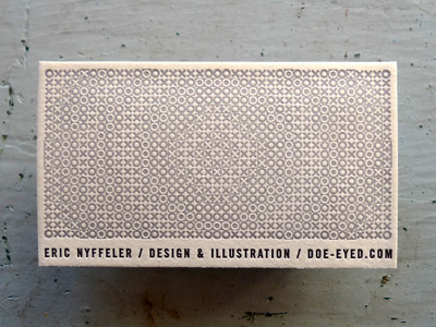 white and pale pink business card featuring an intricate pattern design