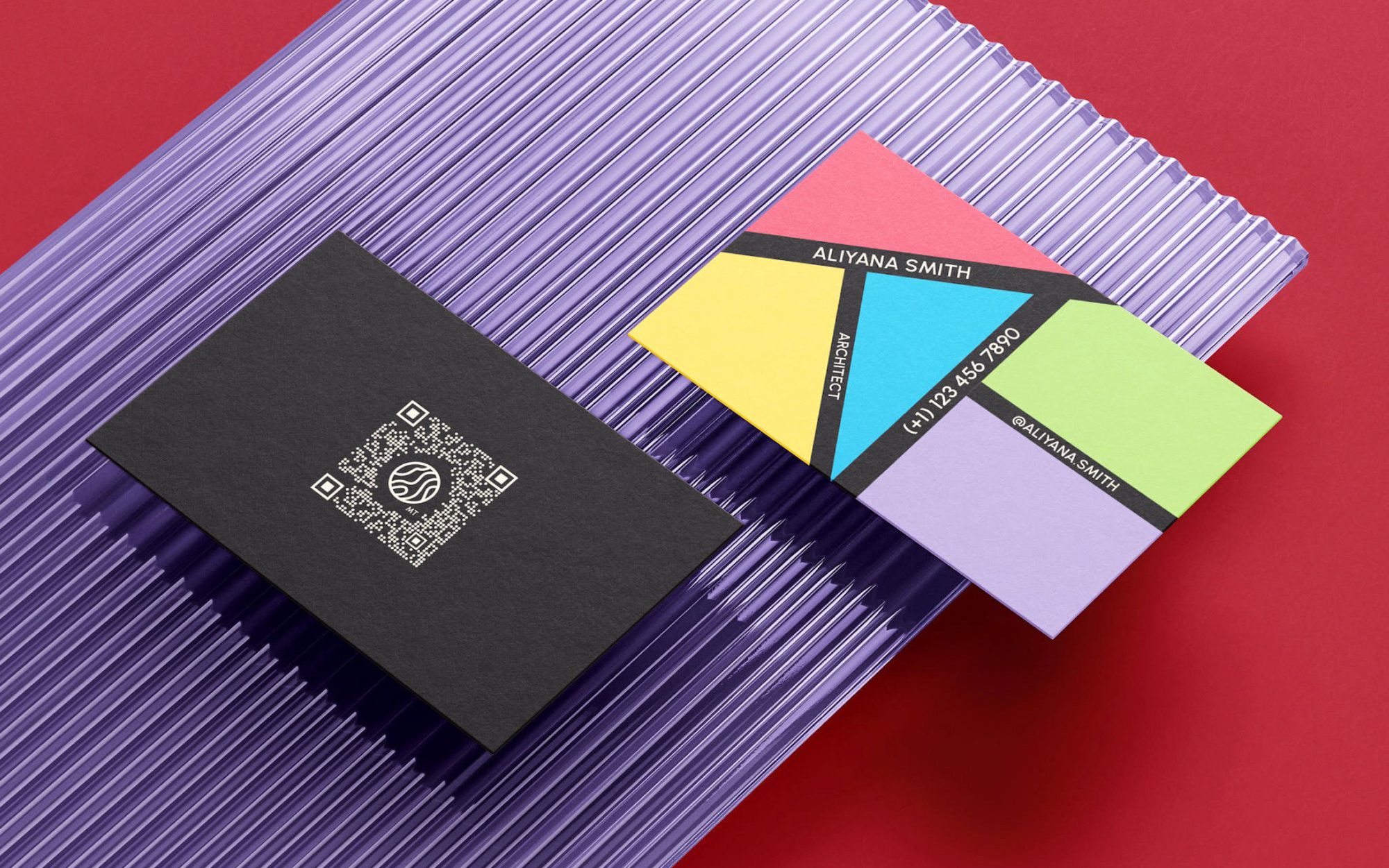 colorblock business card with a solid black side and white text