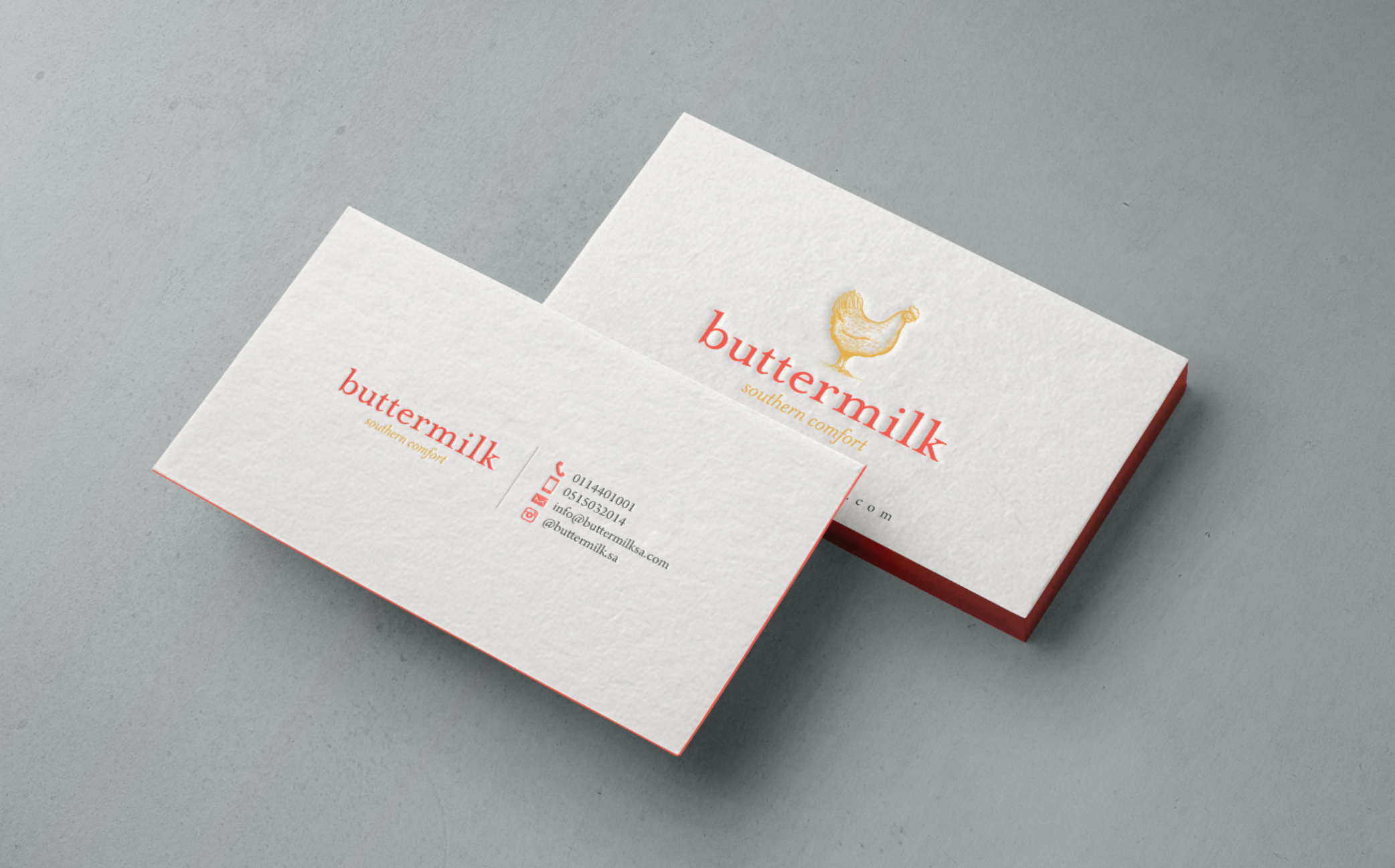 simple business card design with an embossed illustration of a chicken with the text