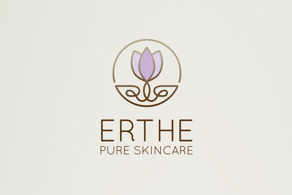 circular logo showing a two-toned purple tulip