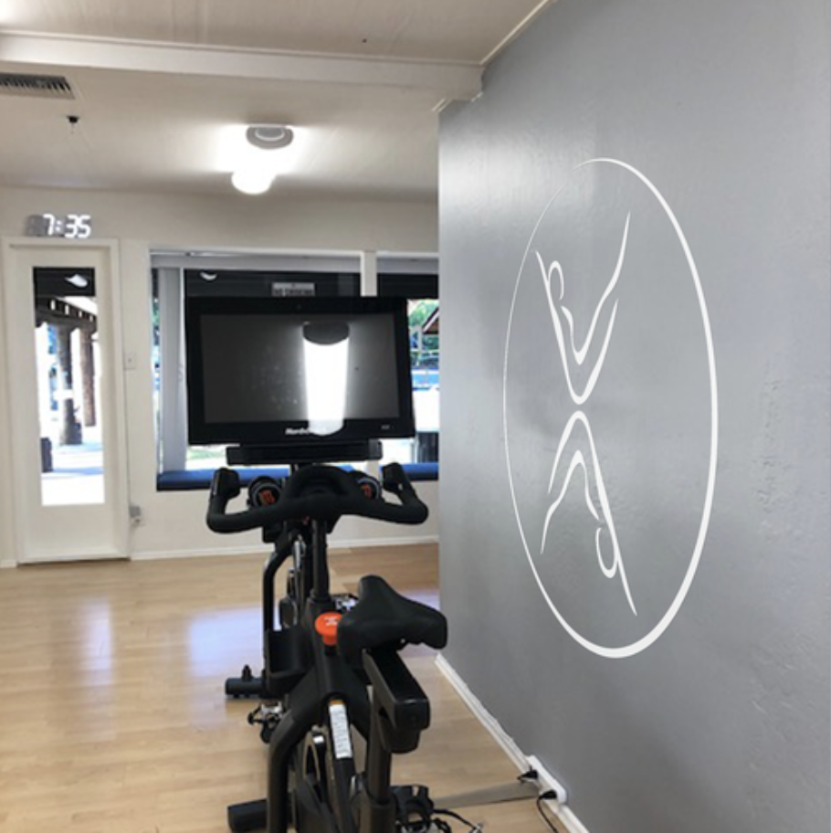 Minimal and symmetrical wall sticker displaying brand logo