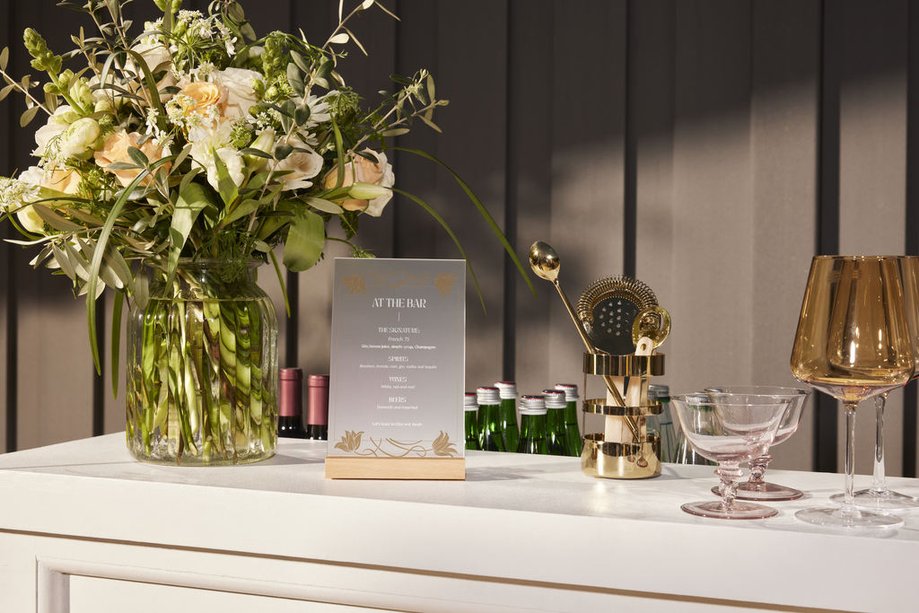 Minimal wedding idea sign featuring custom themed cocktails