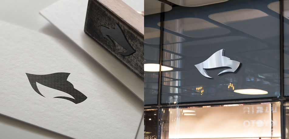 Tonal hues of black, gold and beige make up this brand's abstract logo and storefront sign