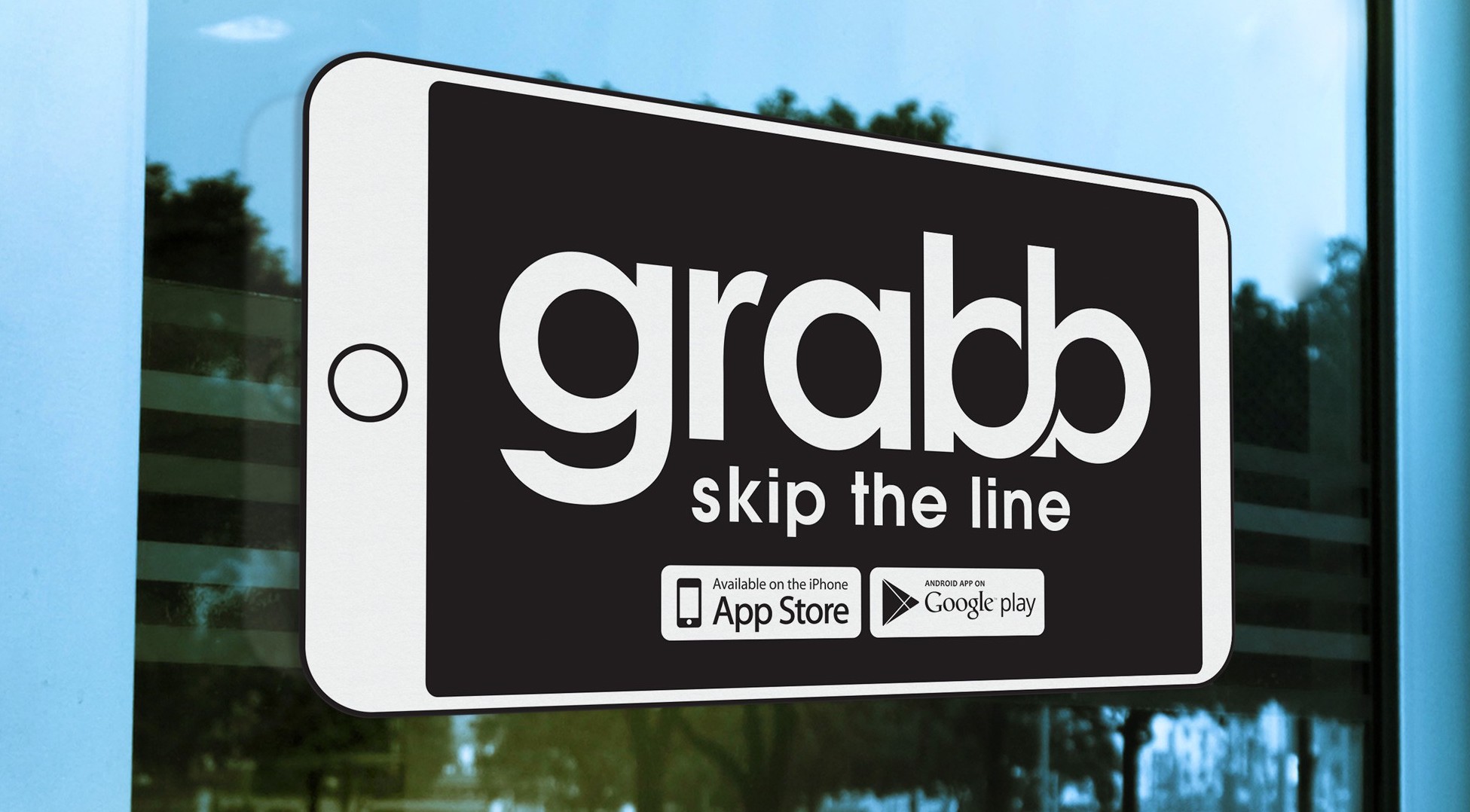 Grabb app sticker on a window