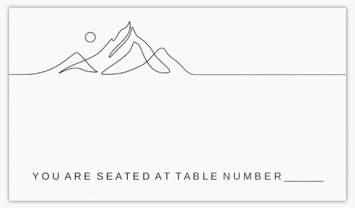 Place card featuring line illustration of mountains and the sun