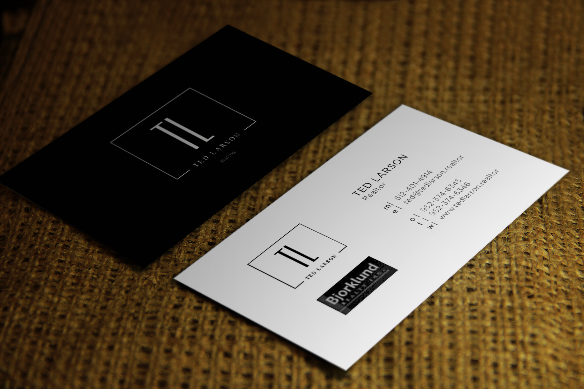 Minimalist black-and-white real estate business card