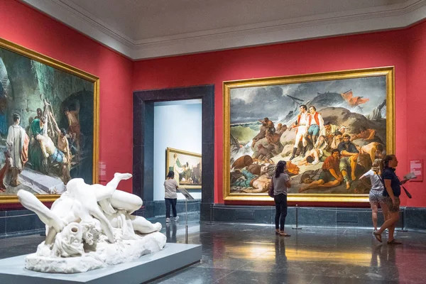 group of people in a museum gallery