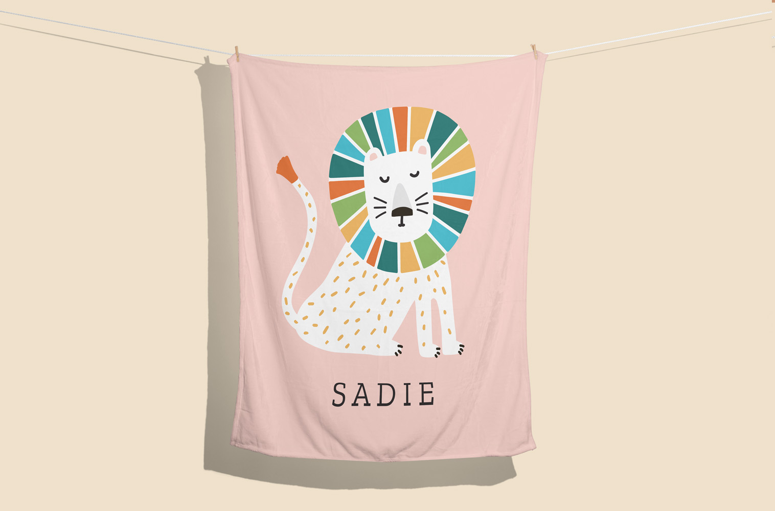 A personalized baby blanket with a lion illustration