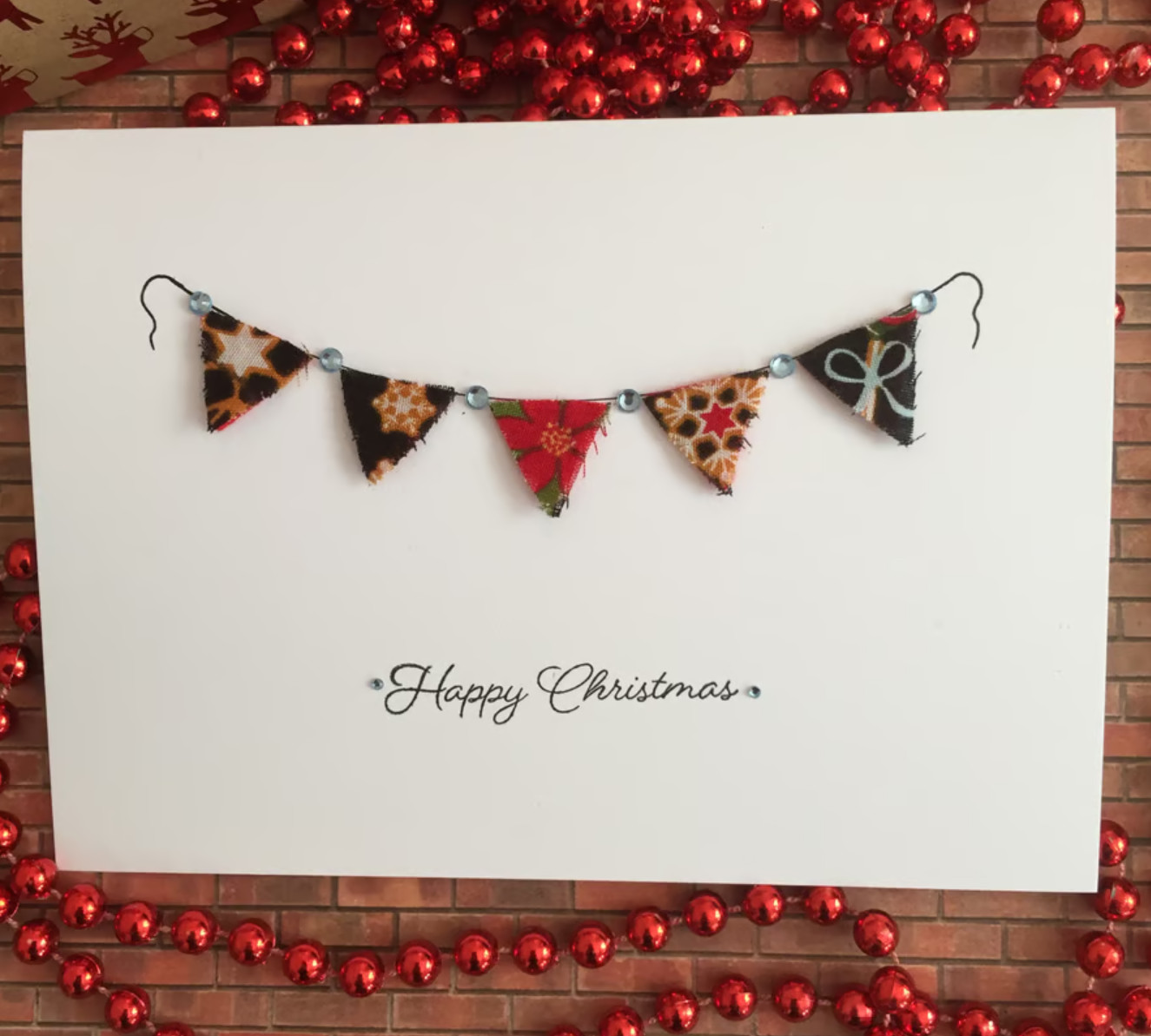 DIY Christmas card design made with fabric scraps