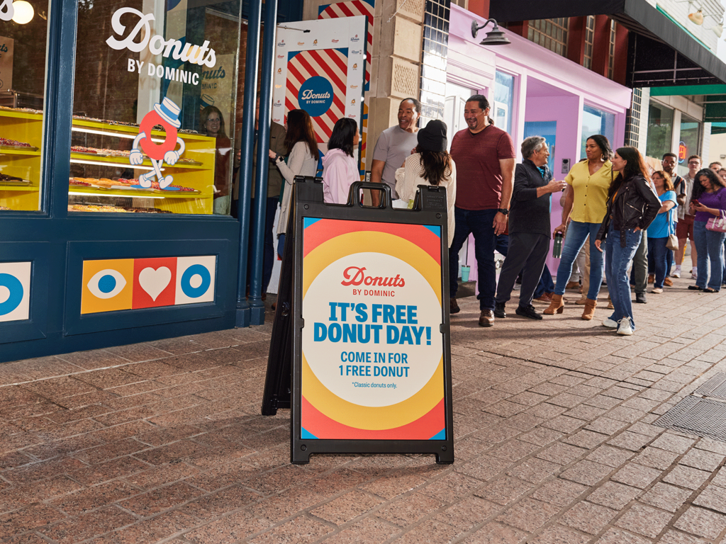 Customers queueing outside a donut store marketing funnel.