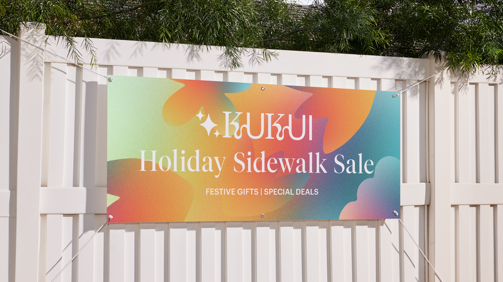Business signage banner for a sidewalk sale.