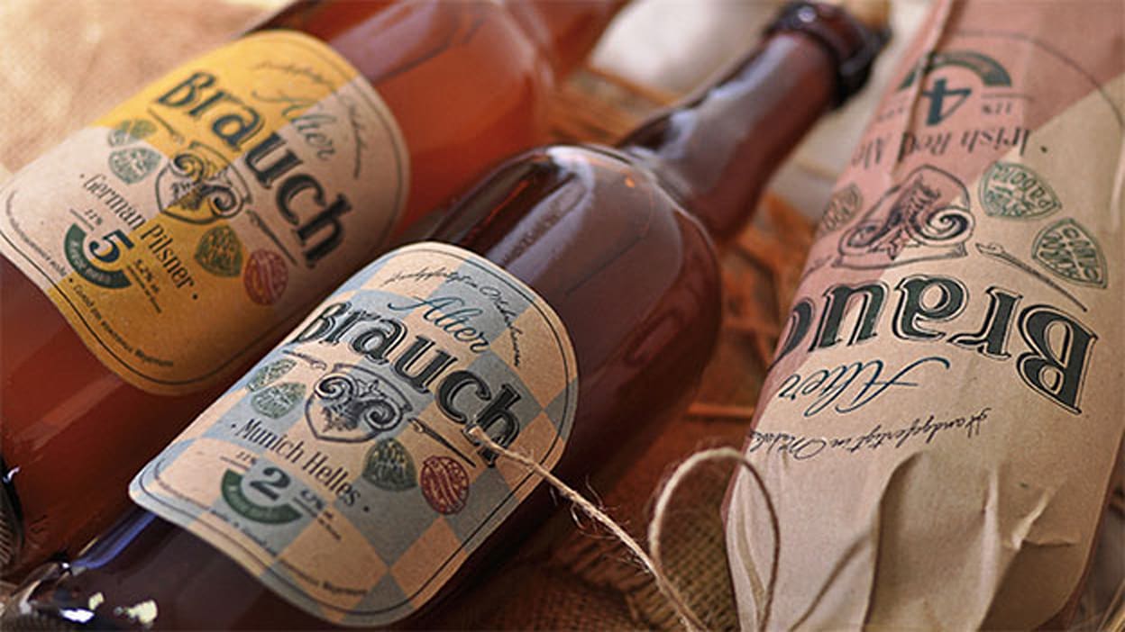 Kraft paper beer bottle wrapped in twine with rustic German-style label.