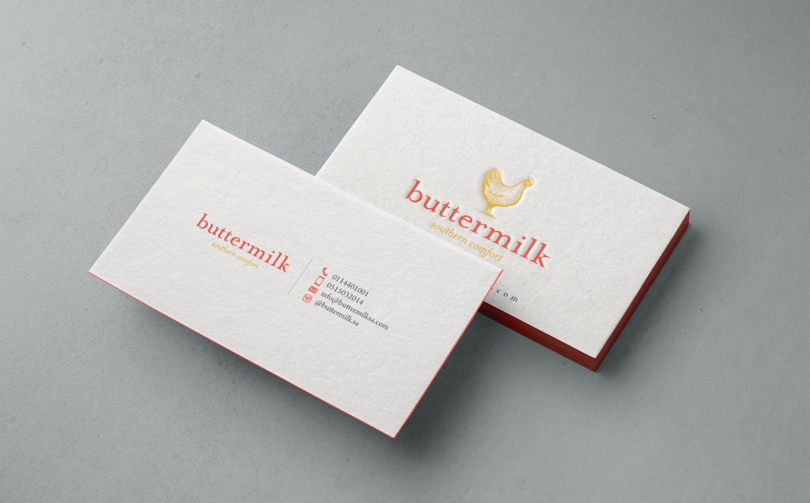 Simple business card design with an embossed illustration of a chicken with the text