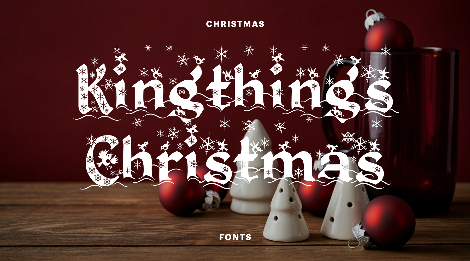 Gothic Kingthings Christmas font with falling snowflakes