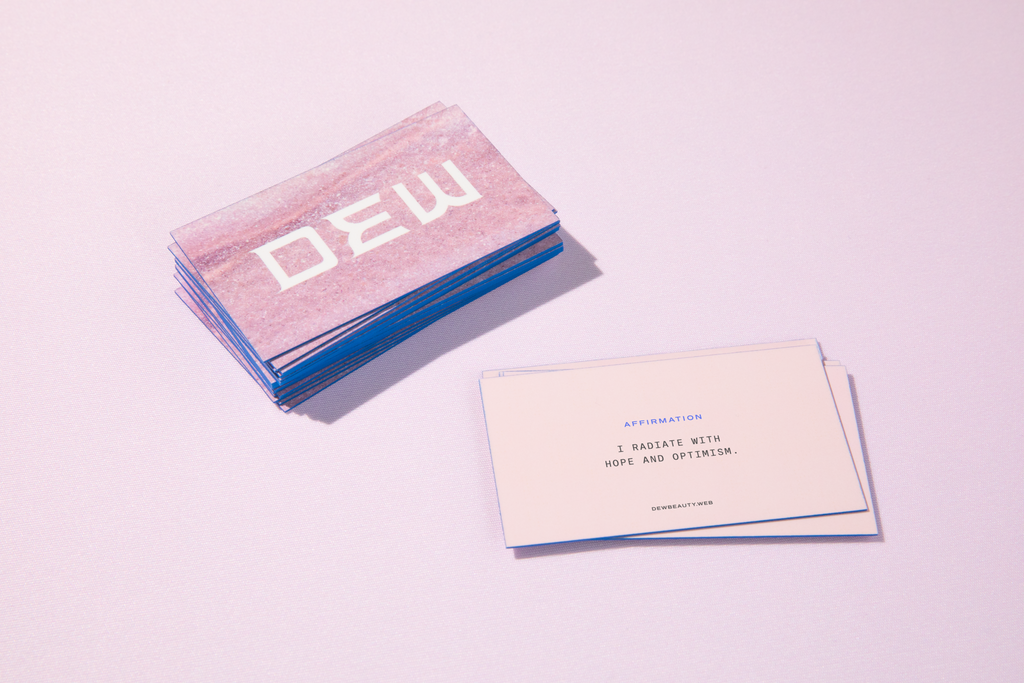 Pink business card as an example of effective use of white space