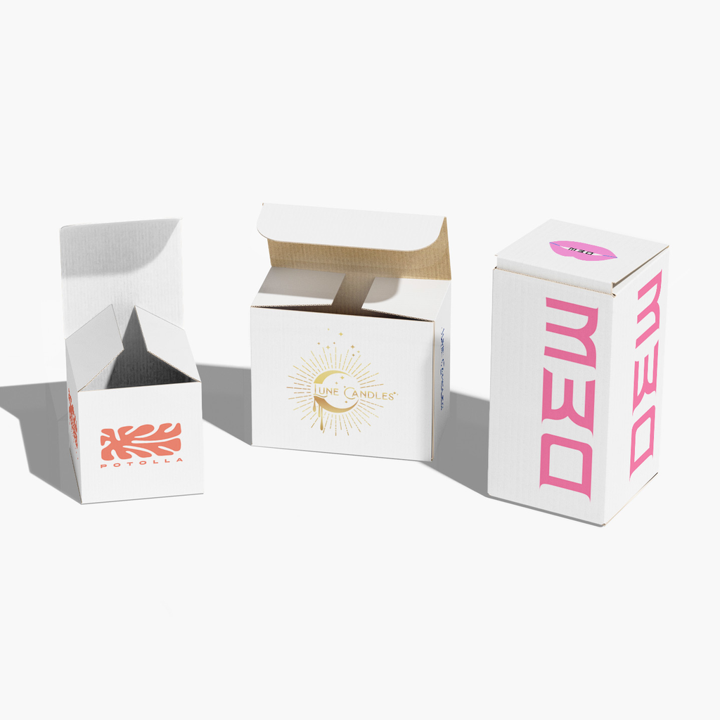 Selection of 3 white cardboard product packages with simple single color logos on outside panels